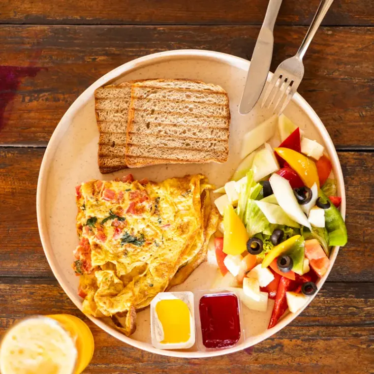 Masala Omelette with Toast as it is served at A2.